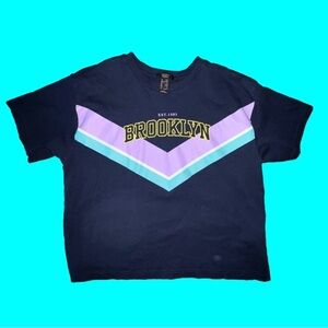 Girl’s 💯 % cotton graphic tee emblazoned BROOKLYN for NY fans! Great colors